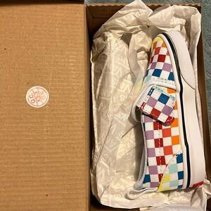 Toddler slip-on vans in the rainbow checkerboard